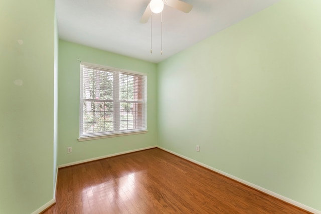 31 N Winterport Cir, The Woodlands, TX 77382 - unfurnished room with wood finished floors and ceiling fan