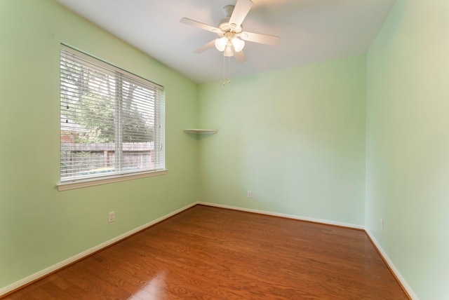 31 N Winterport Cir, The Woodlands, TX 77382 - spare room with wood finished floors and ceiling fan