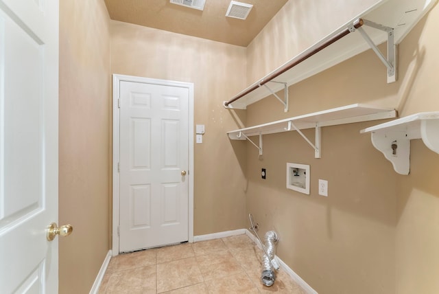 31 N Winterport Cir, The Woodlands, TX 77382 - laundry room with gas dryer hookup, hookup for a washing machine, light tile patterned flooring, and electric dryer hookup