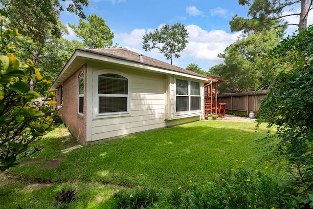 31 N Winterport Cir, The Woodlands, TX 77382 - rear view of house with brick siding
