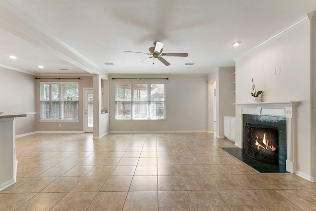 31 N Winterport Cir, The Woodlands, TX 77382 - unfurnished living room with a fireplace, ceiling fan, light tile patterned floors, crown molding, and recessed lighting