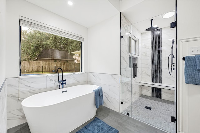 2814 Rustic Woods Dr, Houston, TX 77345 - full bathroom with a marble finish shower, a soaking tub, tile walls, recessed lighting, and marble finish floors