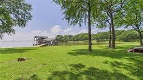 695 Lcr 902, Jewett, TX 75846 - view of community featuring a yard