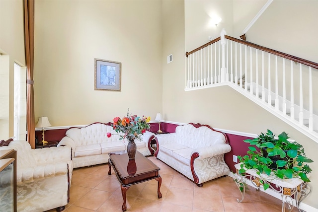 3705 Canterbury Park Dr, Pearland, TX 77584 - tiled living area with stairway and a towering ceiling