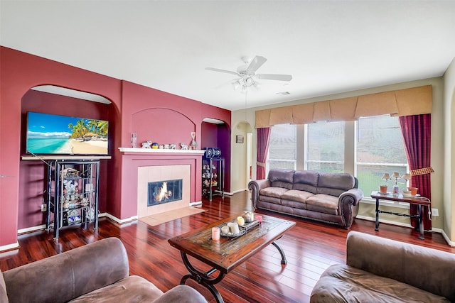 3705 Canterbury Park Dr, Pearland, TX 77584 - living room with wood finished floors, a tile fireplace, and ceiling fan