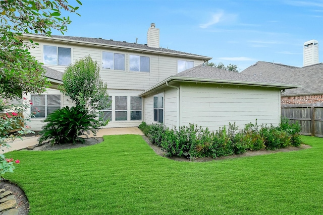 3705 Canterbury Park Dr, Pearland, TX 77584 - back of house featuring a chimney