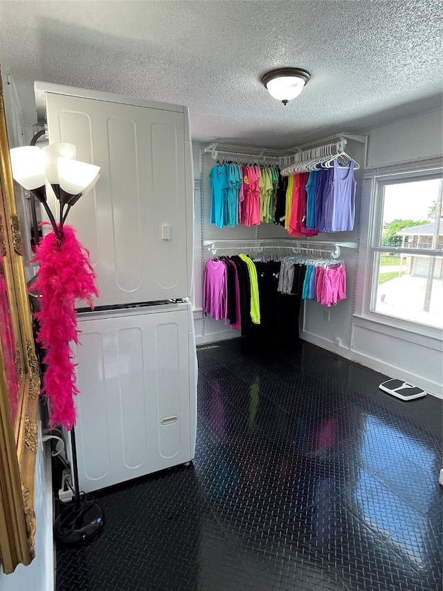 6625 Morris, Galveston, TX 77551 - walk in closet featuring stacked washer / drying machine