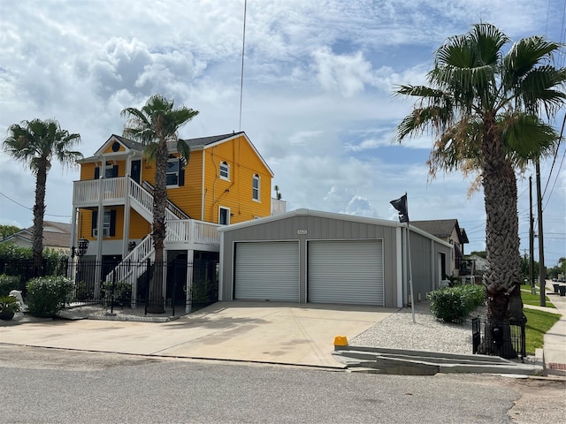 6625 Morris, Galveston, TX 77551 - view of front of property with an outdoor structure and stairs