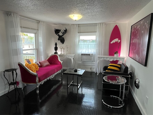 6625 Morris, Galveston, TX 77551 - bedroom with multiple windows, a textured ceiling, and cooling unit