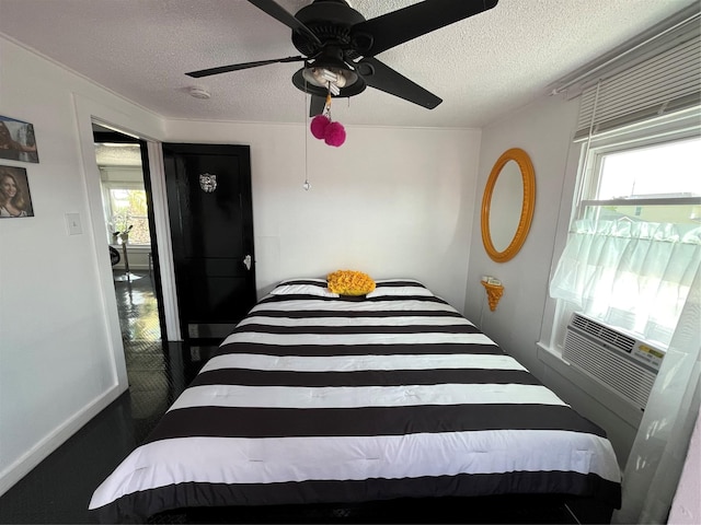 6625 Morris, Galveston, TX 77551 - bedroom featuring a textured ceiling, a ceiling fan, and cooling unit
