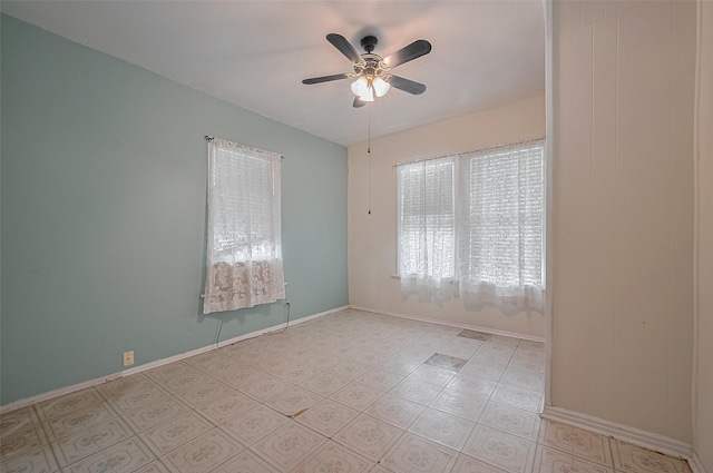 512 Threlkeld St, Houston, TX 77007 - empty room with ceiling fan and baseboards