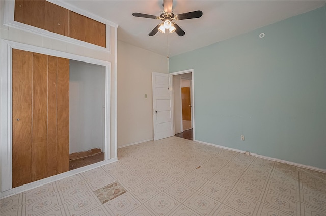 512 Threlkeld St, Houston, TX 77007 - unfurnished bedroom featuring baseboards and ceiling fan