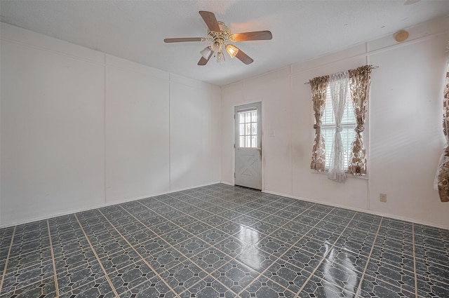 512 Threlkeld St, Houston, TX 77007 - spare room featuring dark flooring and a ceiling fan