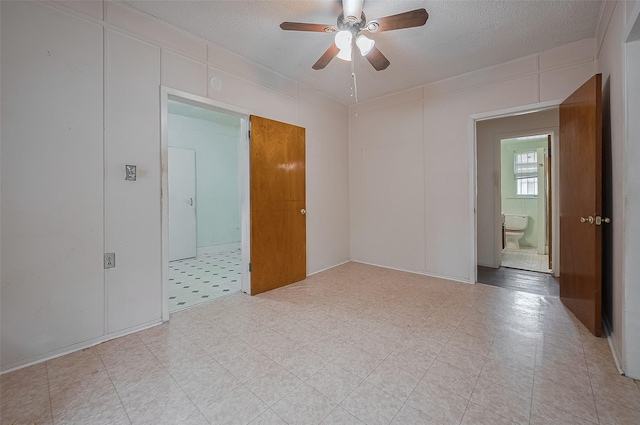 512 Threlkeld St, Houston, TX 77007 - unfurnished room featuring ceiling fan and a textured ceiling