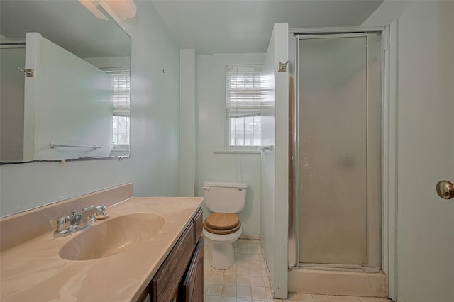 512 Threlkeld St, Houston, TX 77007 - bathroom with vanity, a shower stall, plenty of natural light, and tile patterned flooring