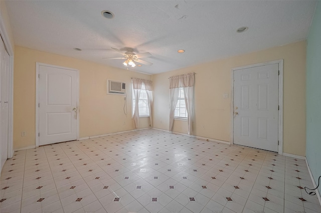 512 Threlkeld St, Houston, TX 77007 - entryway with a wall unit AC, a ceiling fan, and recessed lighting