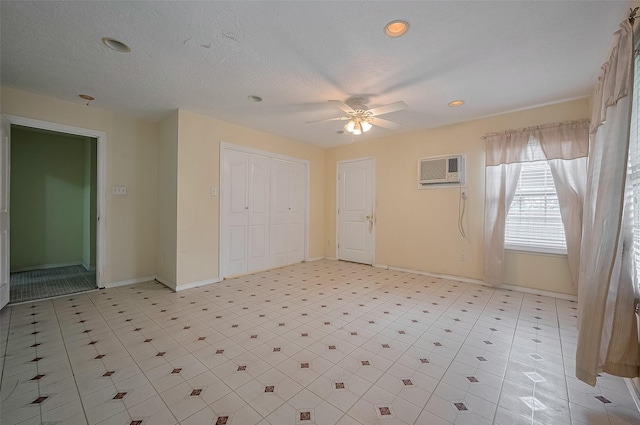 512 Threlkeld St, Houston, TX 77007 - unfurnished bedroom featuring an AC wall unit, a closet, ceiling fan, and recessed lighting