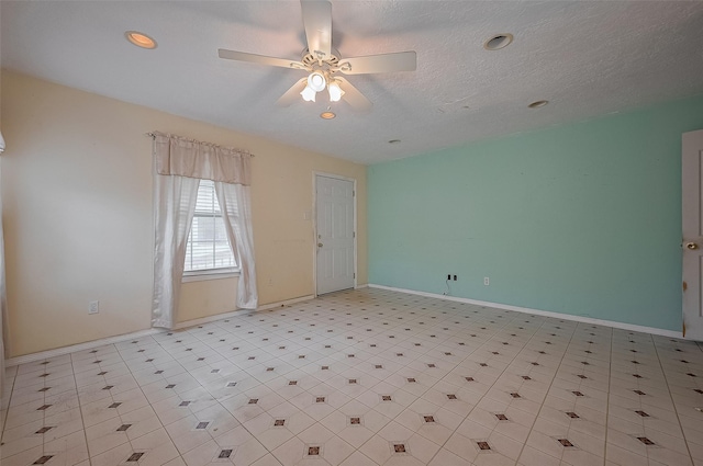 512 Threlkeld St, Houston, TX 77007 - spare room with ceiling fan and recessed lighting