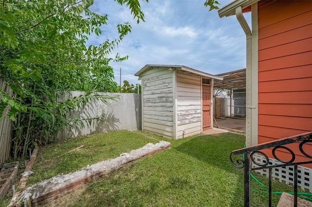 512 Threlkeld St, Houston, TX 77007 - fenced backyard with a storage unit