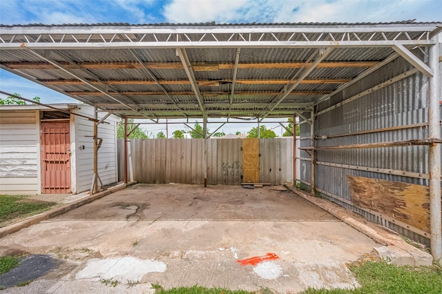 512 Threlkeld St, Houston, TX 77007 - view of vehicle parking with an exterior structure and a carport