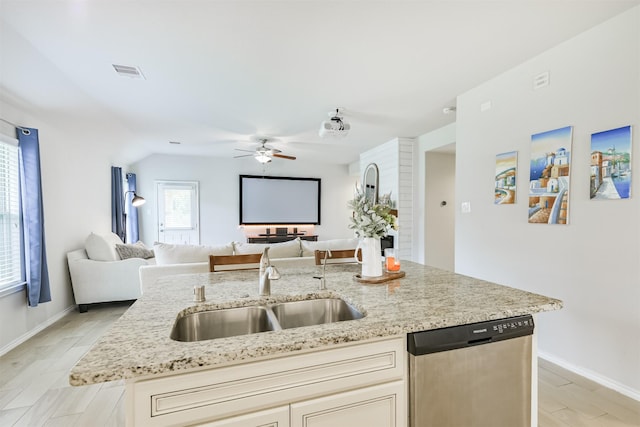 24218 Birchwood Creek Ct, Spring, TX 77389 - kitchen featuring stainless steel dishwasher, open floor plan, and light stone countertops