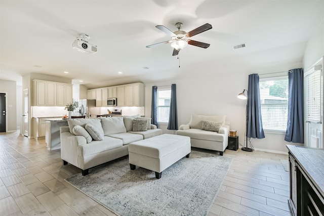 24218 Birchwood Creek Ct, Spring, TX 77389 - living area featuring a ceiling fan, wood tiled floors, and recessed lighting