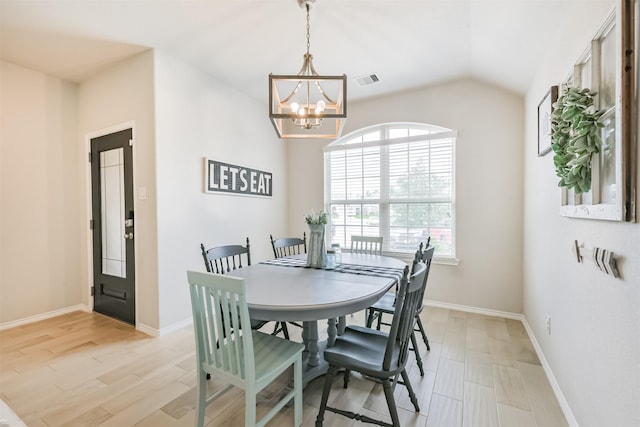 24218 Birchwood Creek Ct, Spring, TX 77389 - dining room with a chandelier, lofted ceiling, and light wood finished floors