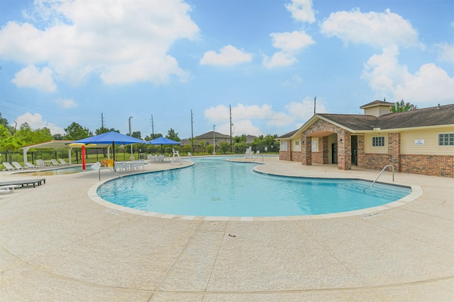 24218 Birchwood Creek Ct, Spring, TX 77389 - community pool featuring a patio