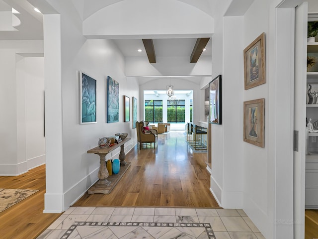 518 Hallie Dr, Houston, TX 77024 - corridor featuring light wood-style floors, beam ceiling, a chandelier, and recessed lighting