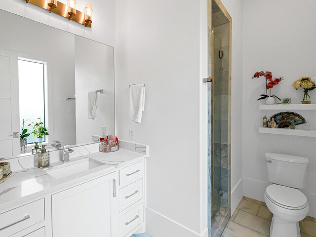 518 Hallie Dr, Houston, TX 77024 - full bathroom featuring vanity, a shower, and tile patterned floors