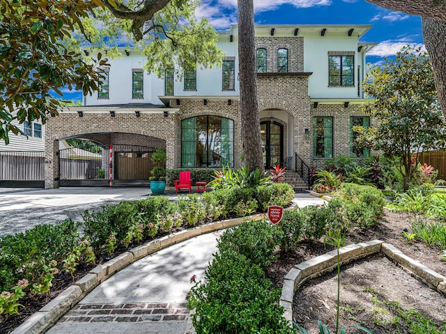 518 Hallie Dr, Houston, TX 77024 - view of front of property featuring brick siding and stucco siding