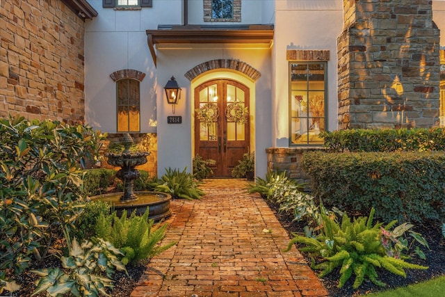 7614 Brykerwoods Dr, Houston, TX 77055 - property entrance with stone siding and stucco siding