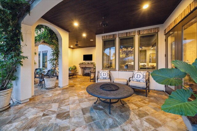 7614 Brykerwoods Dr, Houston, TX 77055 - view of patio / terrace featuring an outdoor living space with a fire pit