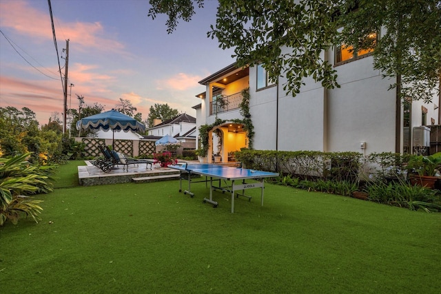 7614 Brykerwoods Dr, Houston, TX 77055 - view of green lawn featuring a balcony