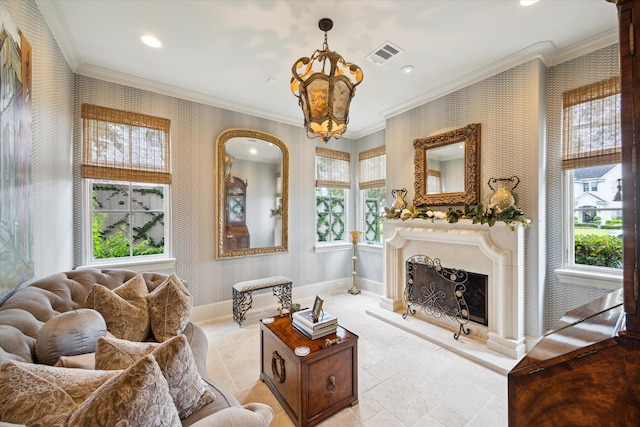 7614 Brykerwoods Dr, Houston, TX 77055 - living room featuring wallpapered walls, ornamental molding, a chandelier, a fireplace with raised hearth, and recessed lighting