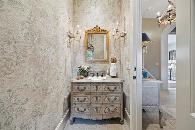 7614 Brykerwoods Dr, Houston, TX 77055 - bathroom featuring vanity and stone tile floors