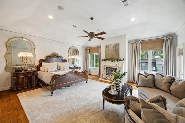 7614 Brykerwoods Dr, Houston, TX 77055 - bedroom featuring wood finished floors, vaulted ceiling, recessed lighting, and a ceiling fan