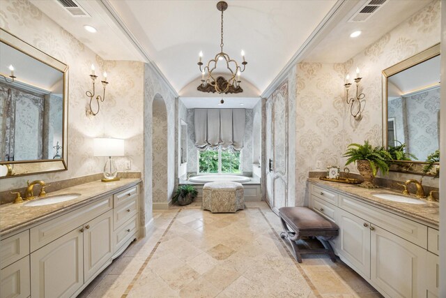7614 Brykerwoods Dr, Houston, TX 77055 - full bathroom with two vanities, a bath, a chandelier, recessed lighting, and lofted ceiling