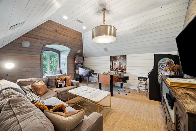 7614 Brykerwoods Dr, Houston, TX 77055 - living room with lofted ceiling, wood walls, and recessed lighting