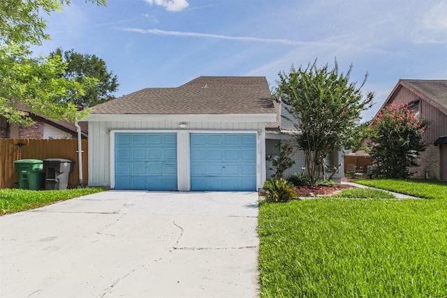 7642 Candlegreen Ln, Houston, TX 77071 - view of front of house featuring an attached garage, driveway, and a shingled roof