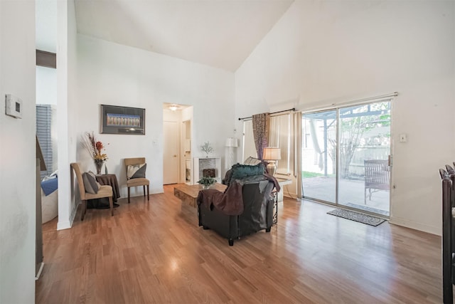 7642 Candlegreen Ln, Houston, TX 77071 - living area featuring high vaulted ceiling and wood finished floors