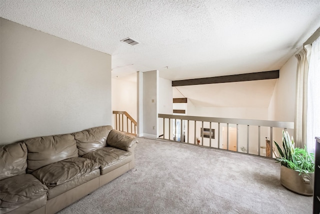 7642 Candlegreen Ln, Houston, TX 77071 - carpeted living room featuring lofted ceiling and a textured ceiling