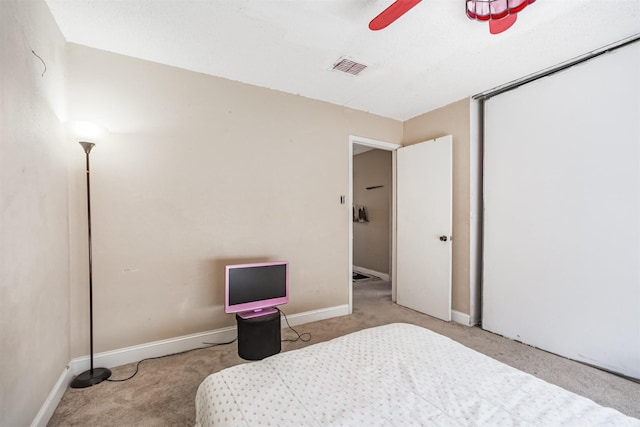 7642 Candlegreen Ln, Houston, TX 77071 - carpeted bedroom with baseboards and a ceiling fan
