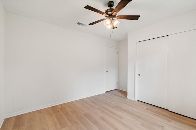 1714 Regal Blue Ct, Fresno, TX 77545 - unfurnished bedroom with light wood-type flooring, a closet, and a ceiling fan