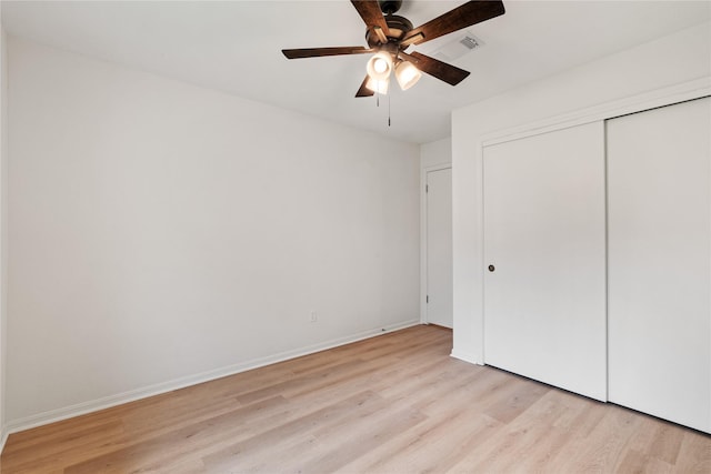 1714 Regal Blue Ct, Fresno, TX 77545 - unfurnished bedroom with light wood finished floors, a closet, and ceiling fan
