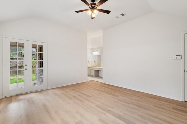 1714 Regal Blue Ct, Fresno, TX 77545 - spare room featuring lofted ceiling, ceiling fan, light wood finished floors, and french doors