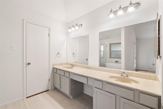1714 Regal Blue Ct, Fresno, TX 77545 - full bathroom featuring double vanity and a soaking tub
