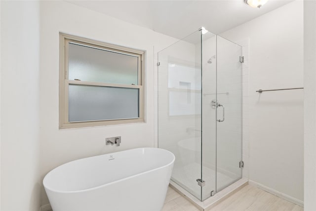 1714 Regal Blue Ct, Fresno, TX 77545 - bathroom with a freestanding tub and a shower stall