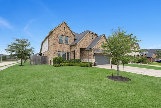 1926 Kingston Meadow Ln, Katy, TX 77494 - traditional-style house featuring brick siding, concrete driveway, and a garage