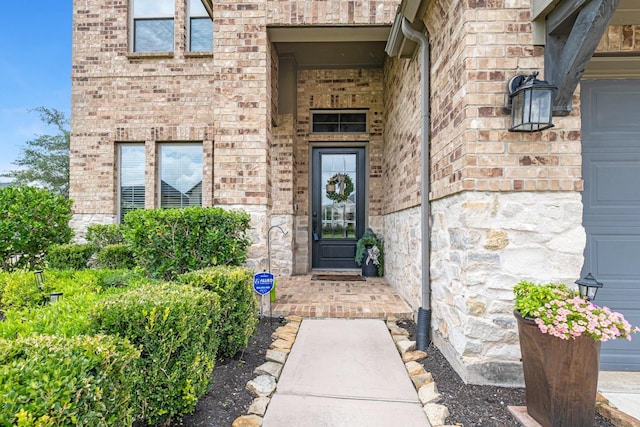 1926 Kingston Meadow Ln, Katy, TX 77494 - doorway to property featuring brick siding and stone siding